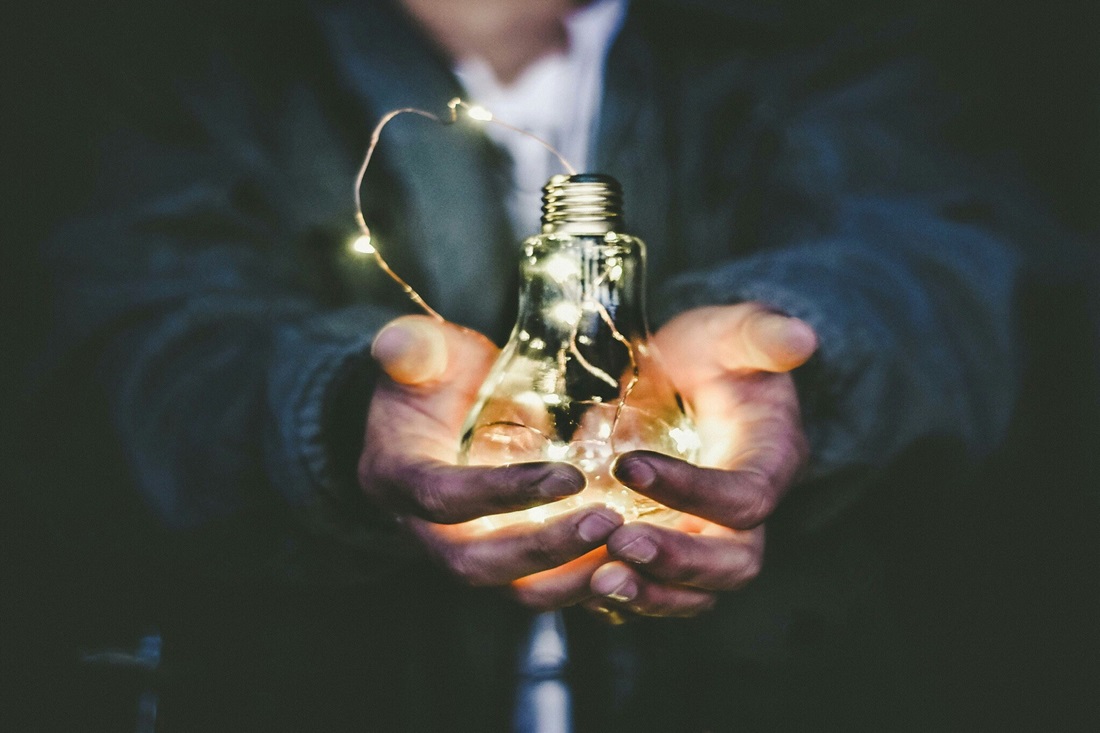 Hands holding light